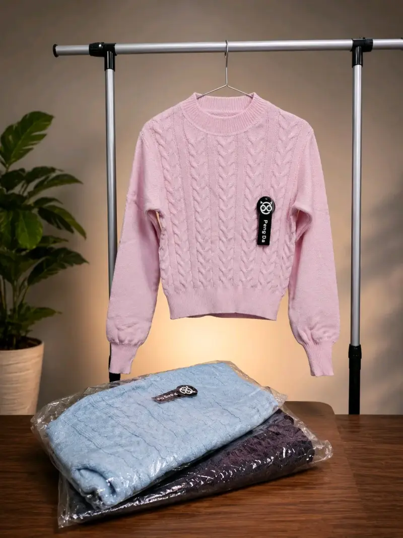 Suéter rosado trenzado nuevo
