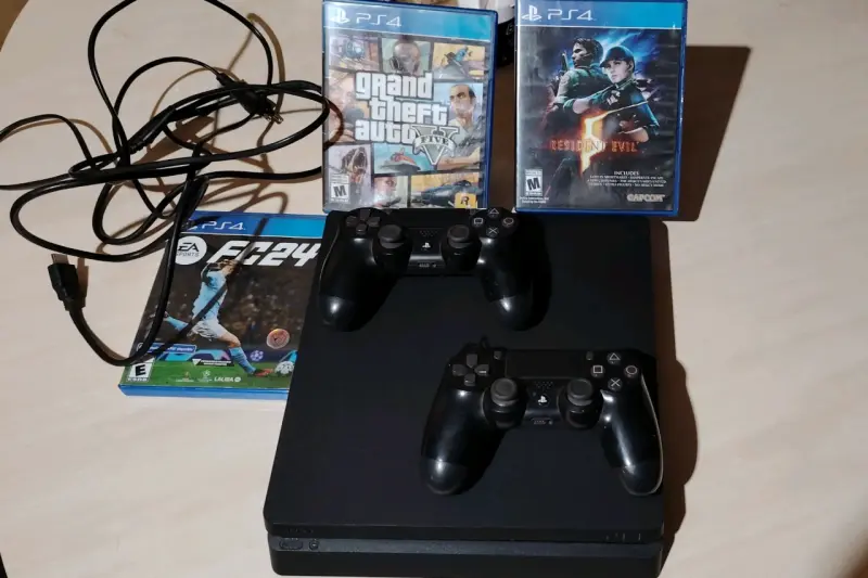Consola PS4 con 2 controles y juegos - 1