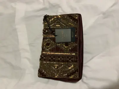 Clutch de lentejuelas doradas - miniatura 1