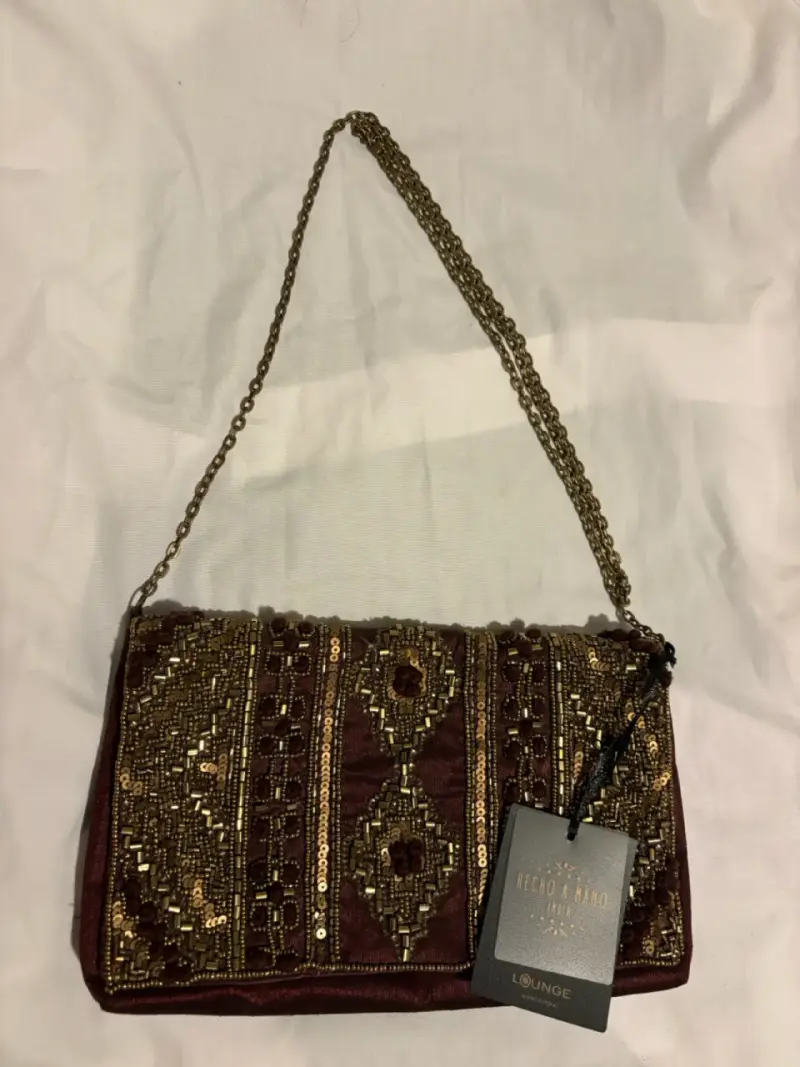 Clutch de lentejuelas doradas - 2