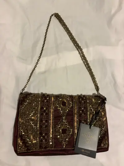 Clutch de lentejuelas doradas - miniatura 3