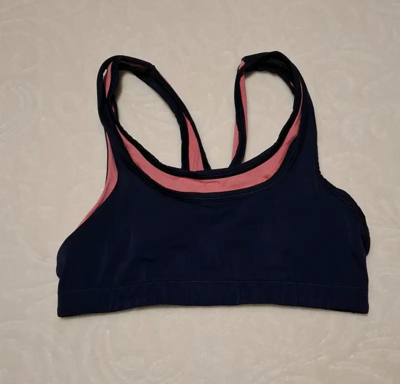 Top deportivo azul y rosa