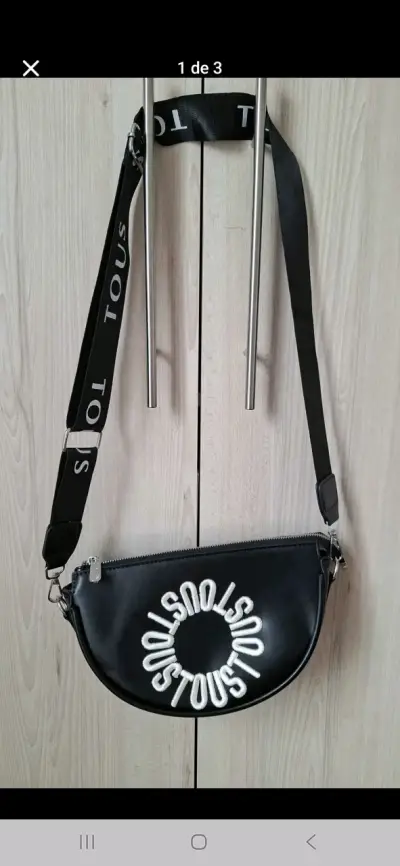 Bandolera negra con logo tous - miniatura 1
