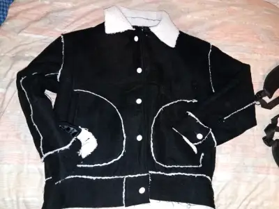 Chaqueta negra - miniatura 1