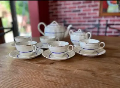Juego de té porcelana con detalles azules - miniatura 1