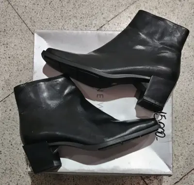Botas negras de cuero sintético - miniatura 4