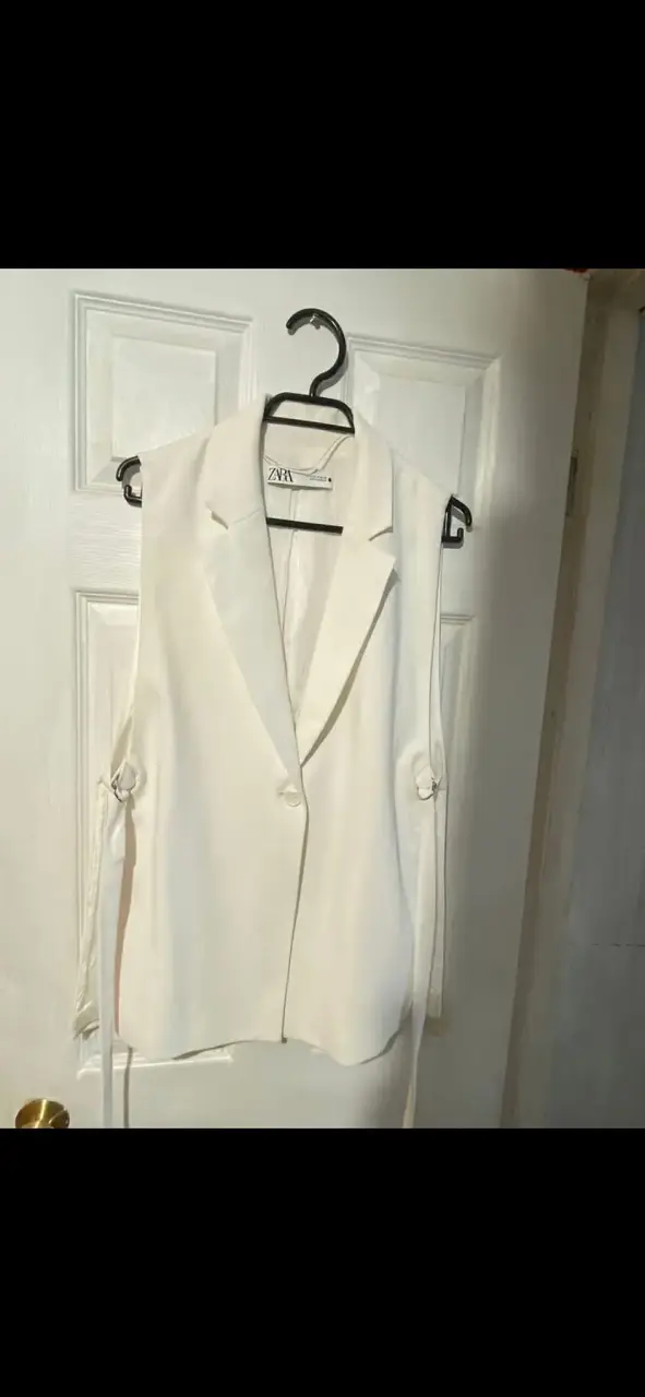 Chaqueta blanca sin mangas