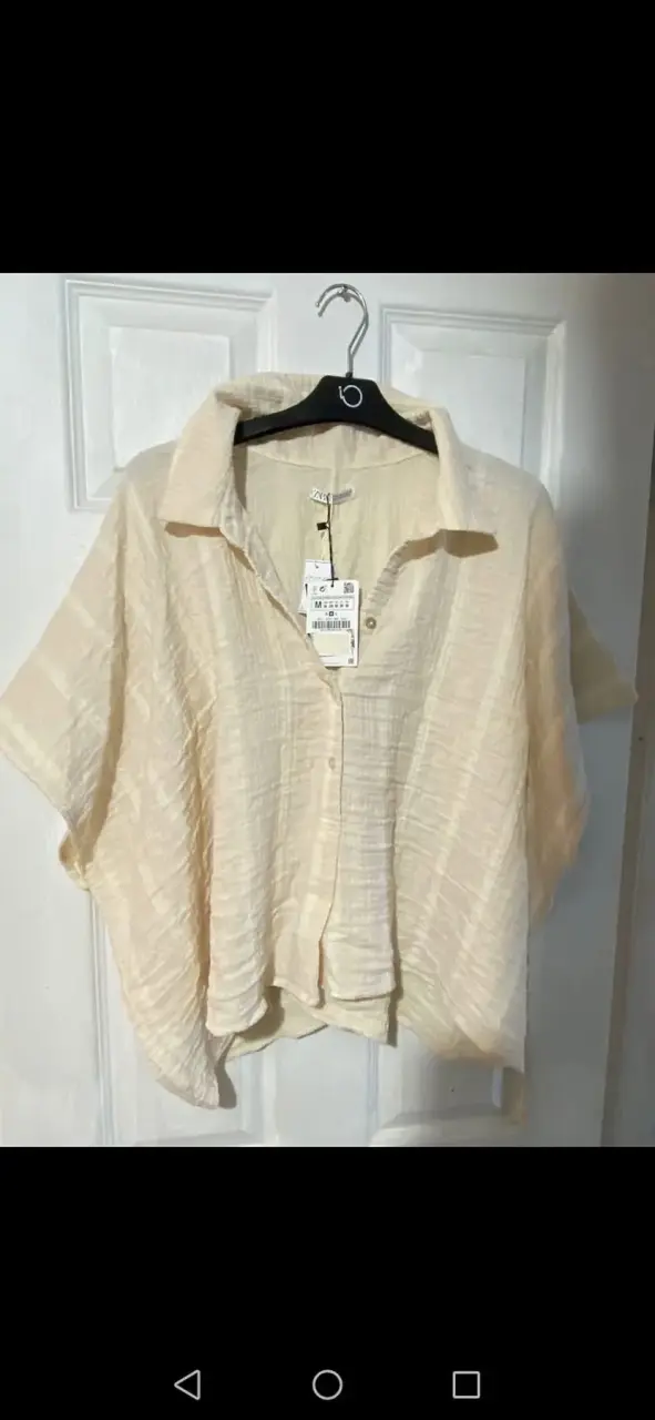 Blusa beige con textura