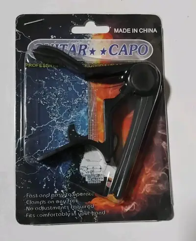 Capo para guitarra clásica acústics y eléctrica - miniatura 1