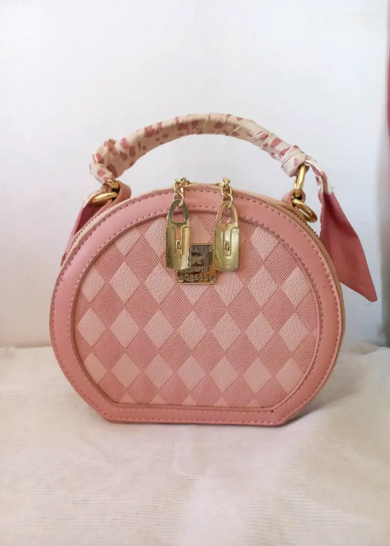 Bolso rosa con estampado geométrico - 1