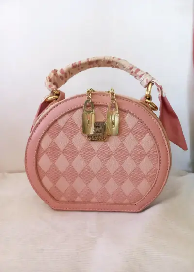 Bolso rosa con estampado geométrico - miniatura 1