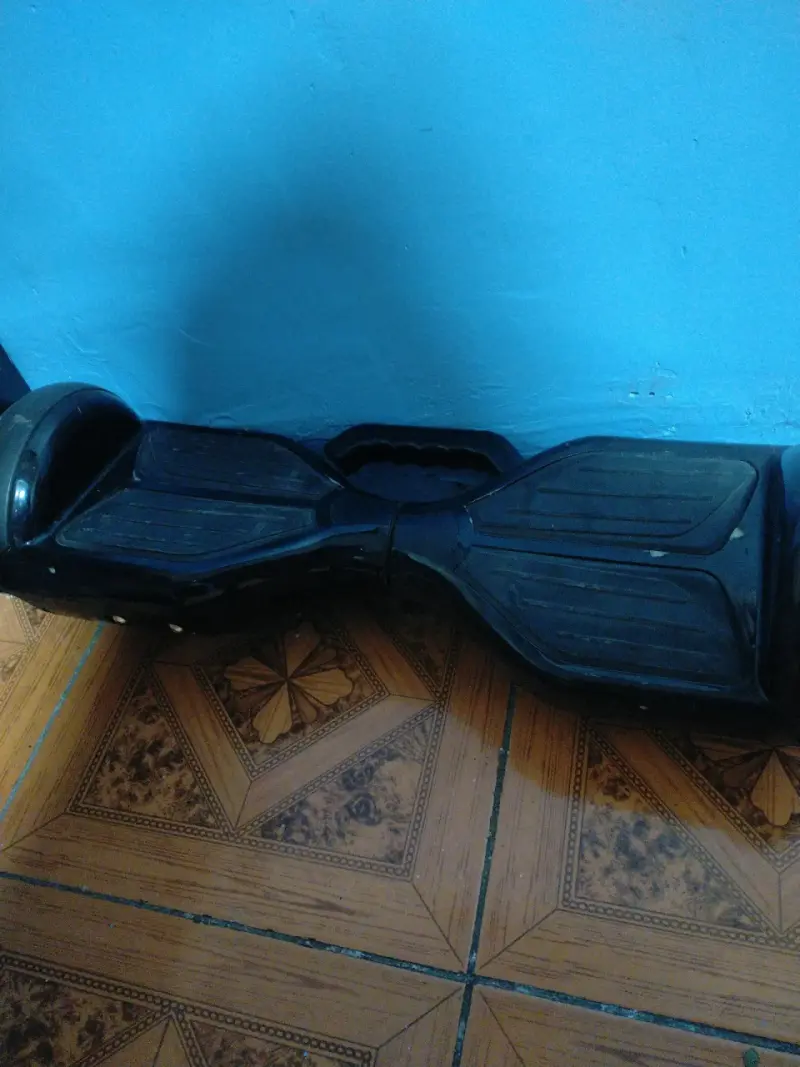 Hoverboard eléctrico negro usado - 1