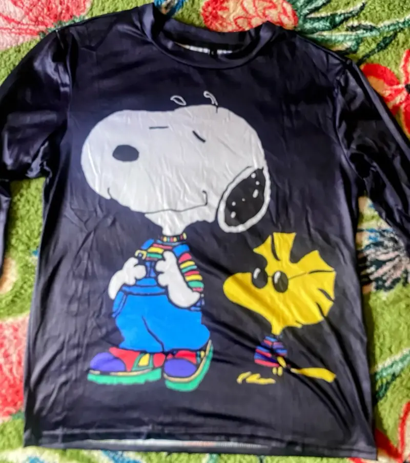 Polera negra Snoopy estampada - 1