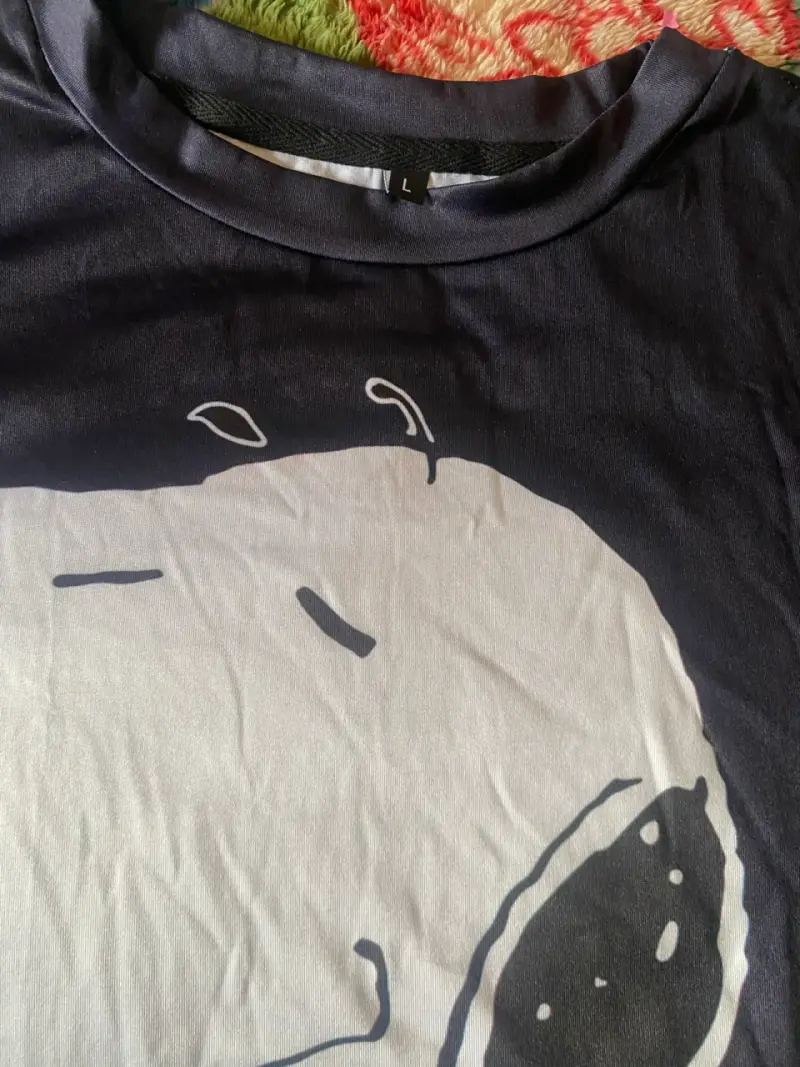 Polera negra Snoopy estampada - 2