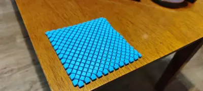 Manta antiestrés impresa en 3D sensorial celeste - miniatura 1