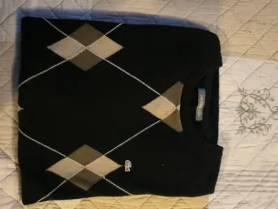 Suéter negro de rombos Lacoste - miniatura 1