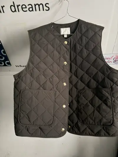 Chaleco acolchado gris oscuro H&M - miniatura 1