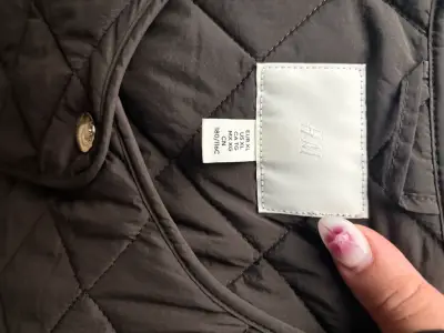 Chaleco acolchado gris oscuro H&M - miniatura 3