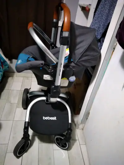 Coche de bebé color gris y azul travel sistem 360° - miniatura 2