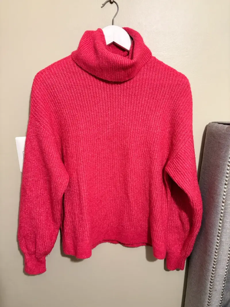 Suéter cuello alto fucsia