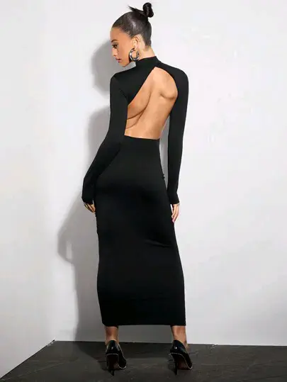 Vestido negro espalda descubierta