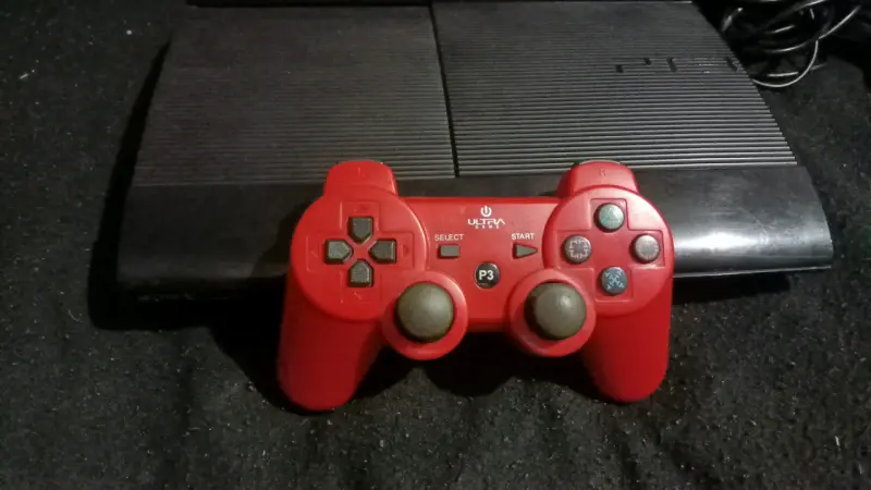 Consola PS3 con control y juegos - 4