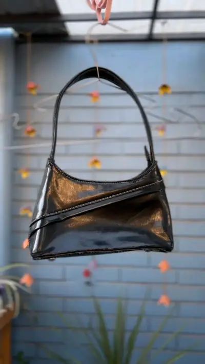 Cartera negra elegante - miniatura 1