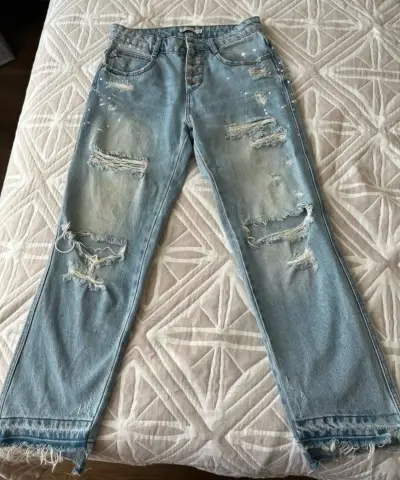 Jeans desgastados azules - miniatura 1