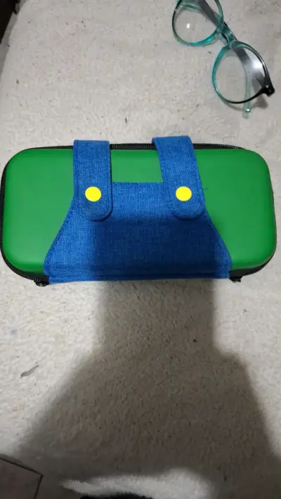 Estuche protector nintendo switch verde azul - miniatura 1