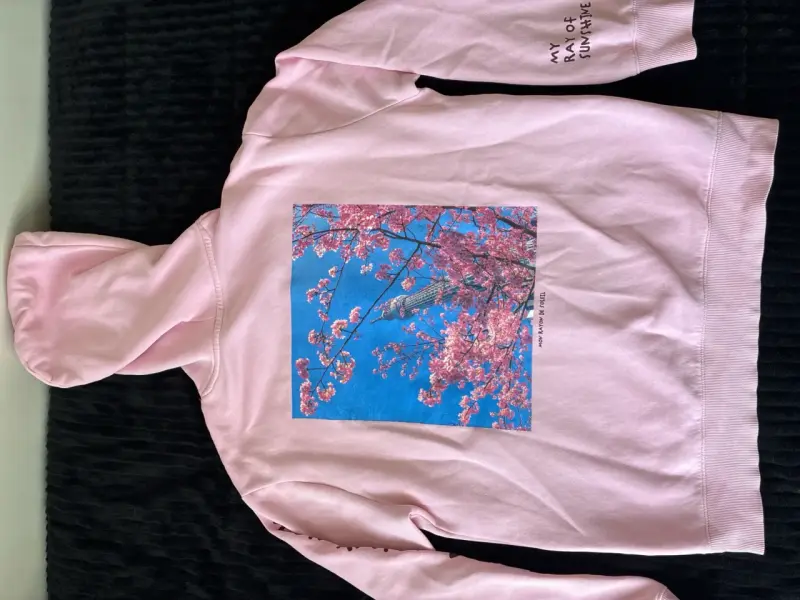 Polerón rosa con estampado floral - 1