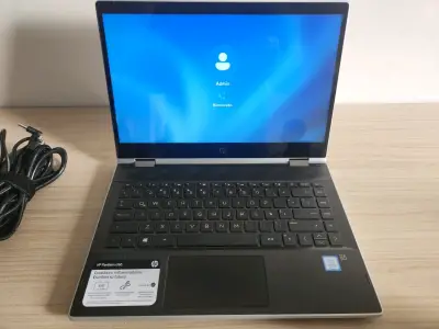 Laptop HP gris en buen estado - miniatura 3