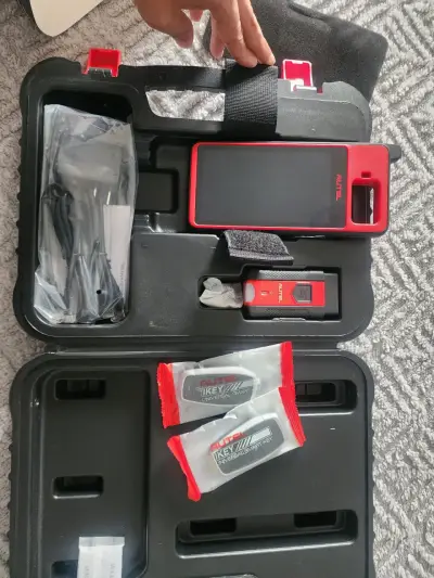 Scanner automotriz Autel KM100 - miniatura 4