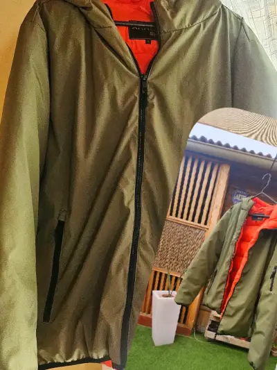 Parka verde con capucha - miniatura 1