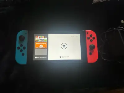 Nintendo Switch V1 Neon + Dock + MicroSD 128G - miniatura 2