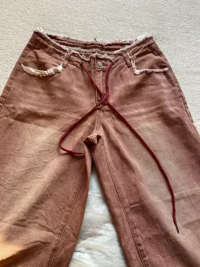 Jeans marrones desgastados - miniatura 1