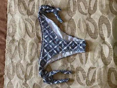 Bikini azul con lazos - miniatura 1
