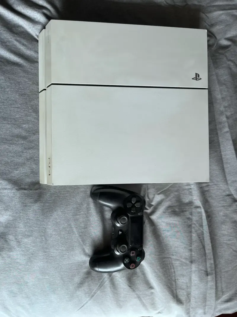 Consola PlayStation 4 blanca con control - 1