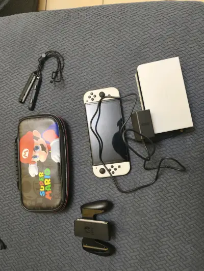Nintendo Switch oled con accesorios - miniatura 1