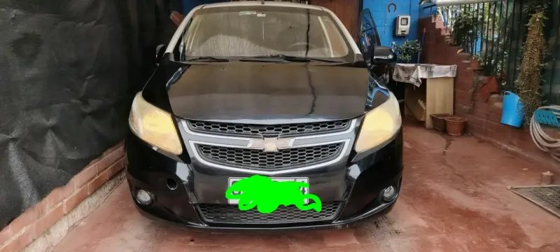 Auto Chevrolet SAIL LT negro en buen estado - 1