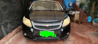 Auto Chevrolet SAIL LT negro en buen estado - miniatura 1