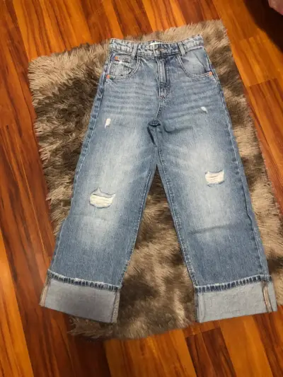Jeans azules desgastados - miniatura 1