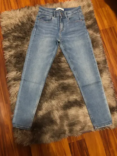 Jeans azules de mezclilla - miniatura 1