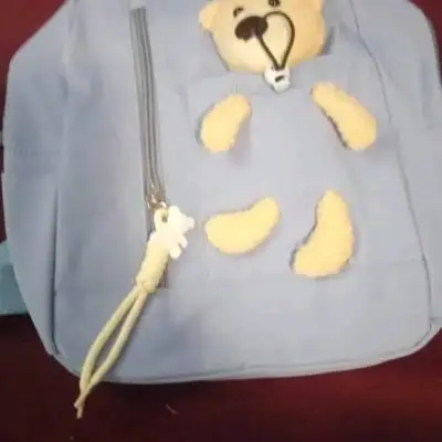 Bolso negro con peluche - miniatura 2