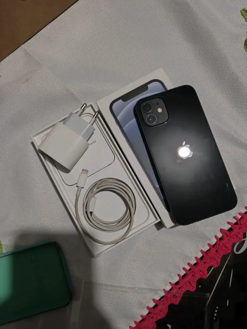 iPhone con accesorios completos - 4