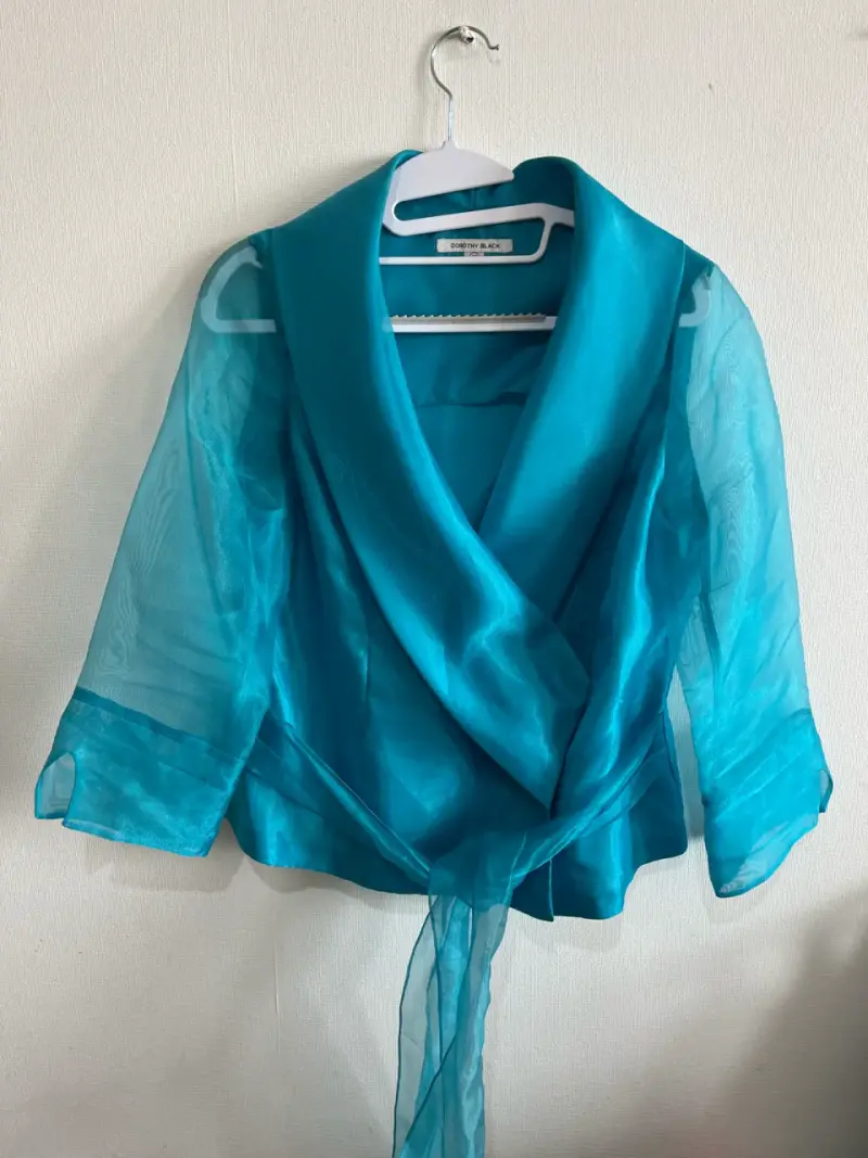 Blusa turquesa elegante