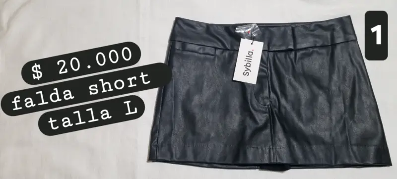 Falda short negra con hebillas - 4