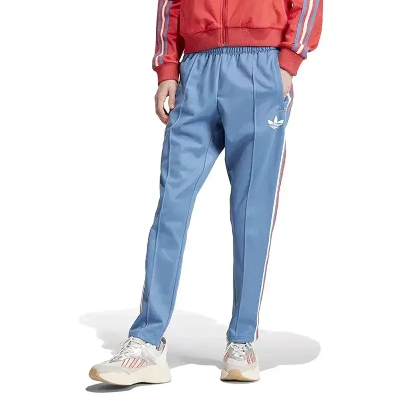 Pantalones deportivos azul con logo - 1