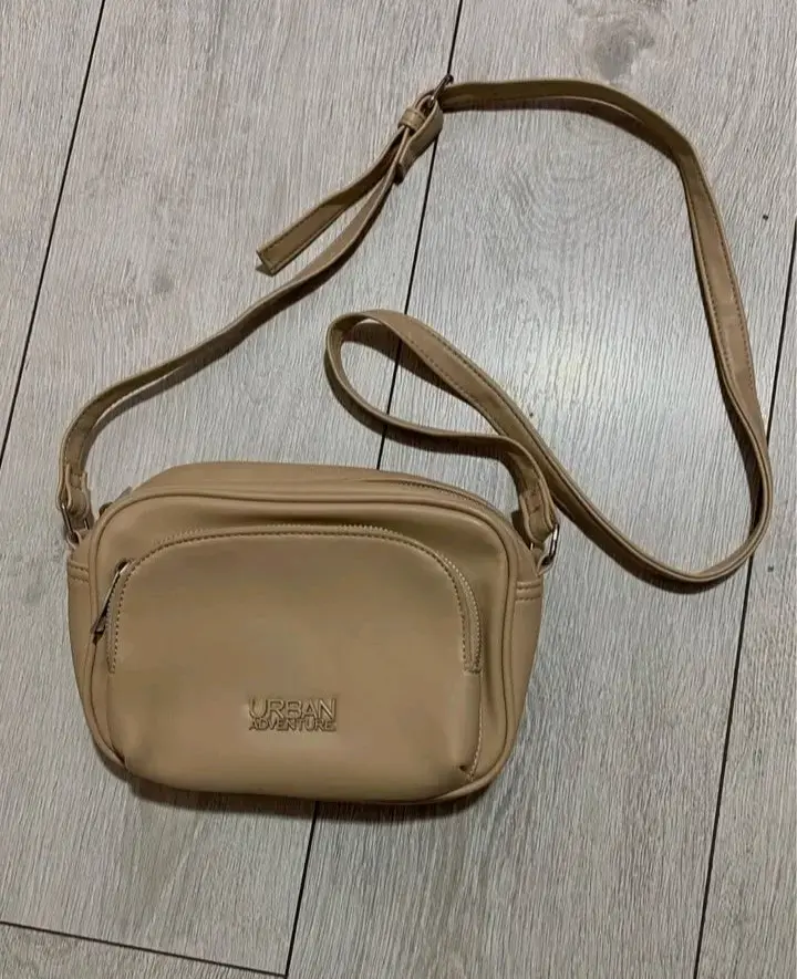 Cartera beige Urban Adventure