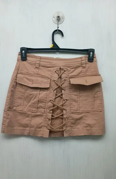 Falda corta beige con lazos - miniatura 1
