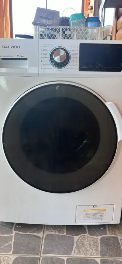Lavadora secadora Daewoo 9 kg blanca - miniatura 1